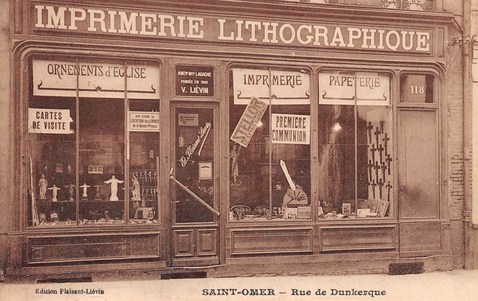 Cette imprimerie se trouvait vers le bas de la rue au n°118. On y vendait aussi des ornements d'église